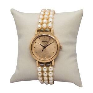 Well-designed watch consisting of three rows of light peach oval pearls attached to a rose gold Sonata dial