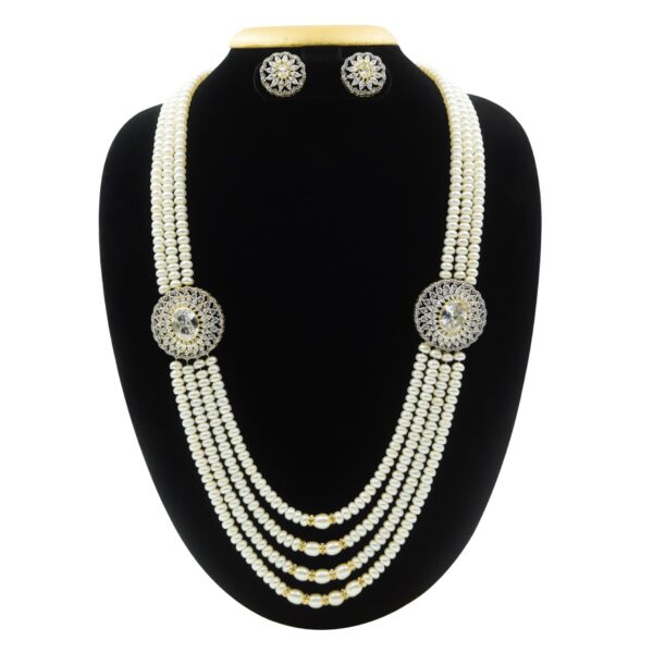 Scintillating Multi-layer Pearls Haar With Grand CZ Side Pendants