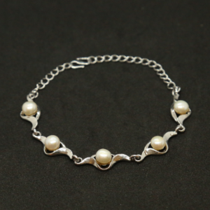 Slender White Button Pearls Bracelet In Silver Finish