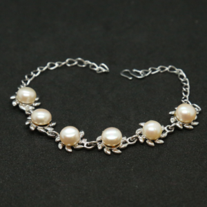 Floral Peach Button Pearls Bracelet In Silver Finish