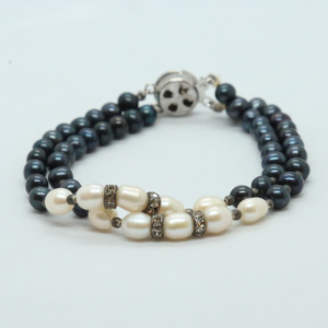 Lovely Blue Pearls Bracelet With White Pearls & AD Spacers