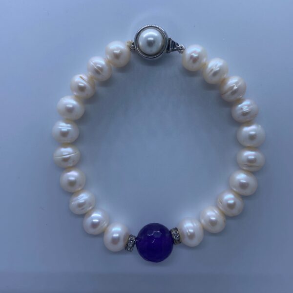 Magnificent White Round Pearls Bracelet With Bright Purple Onyx-top