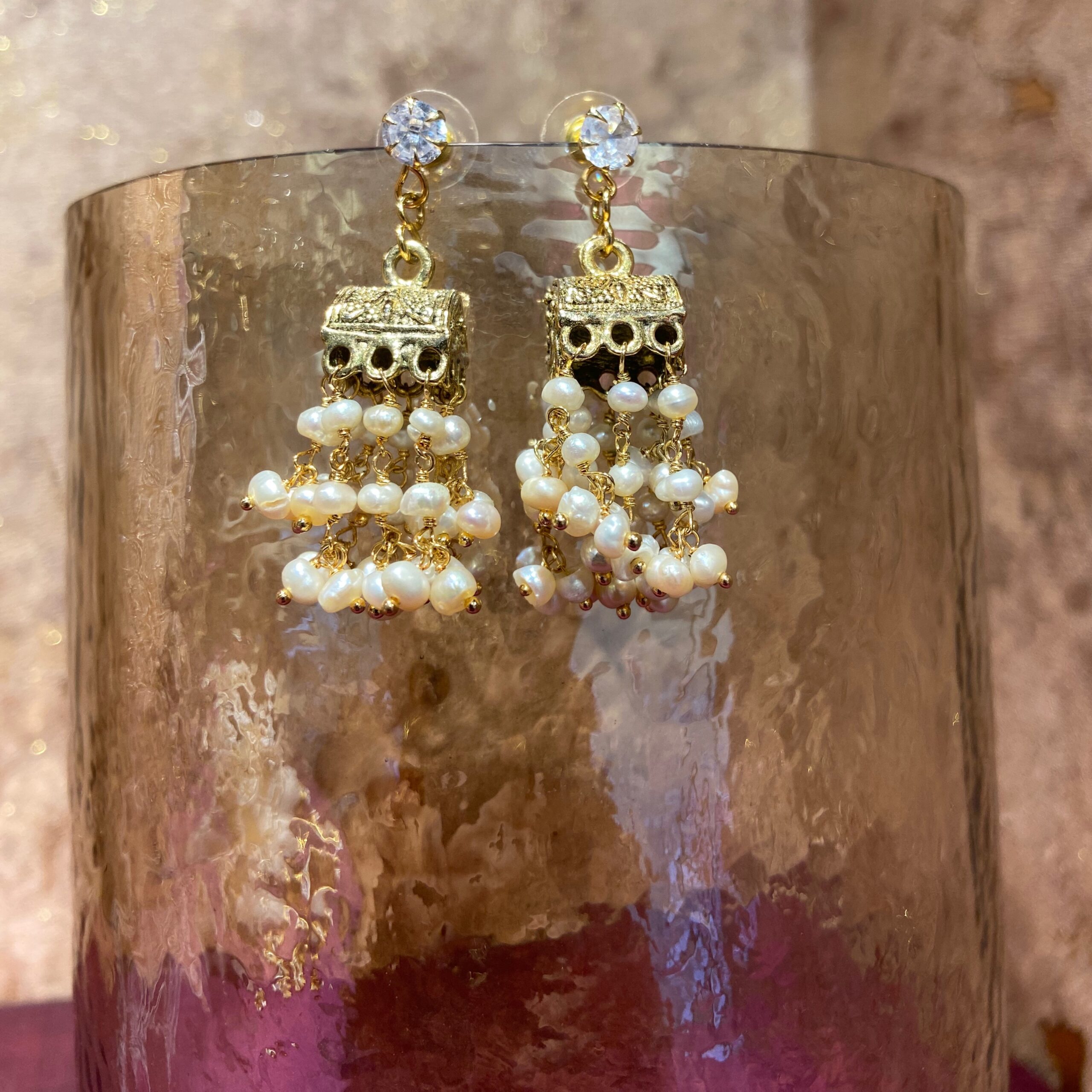 Scintillating Oxidised Jhumkas Featuring White Seed Pearls With CZ Stud