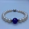 Magnificent White Round Pearls Bracelet With Bright Purple Onyx