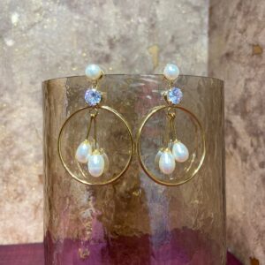 Radial & Contemporary Earrings Featuring White Oval Pearl Drops