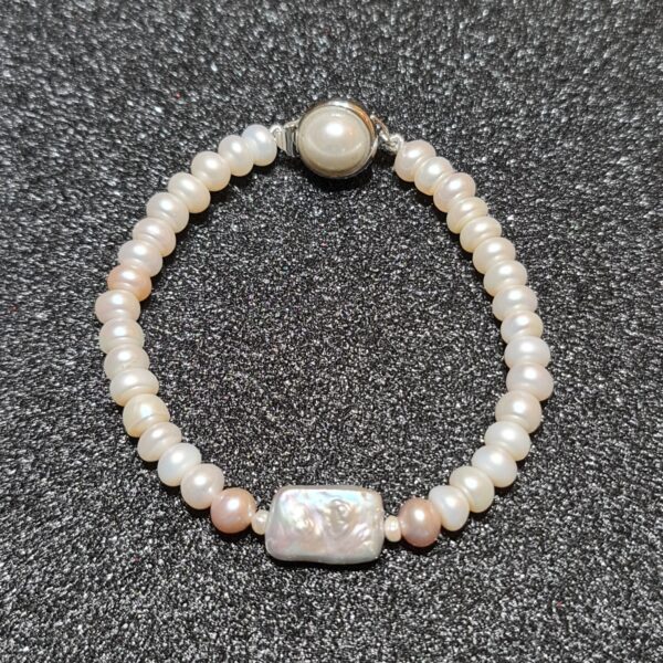 Elegant Bracelet Featuring White Semi-Round Pearls & Silver Flat Baroque