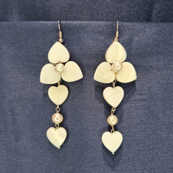 White Pearl Hook Earrings Featuring White Mother Of Pearl Petals