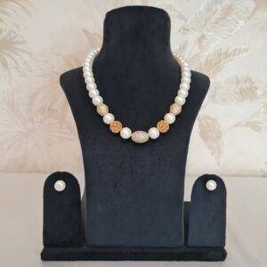Stately 17 Inch Necklace With 10.5 mm White Round Pearls With CZ & Ruby Spacers