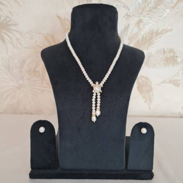 Captivating15Inch White Pearls Necklace With CZ Turtle Pendant & Tassels