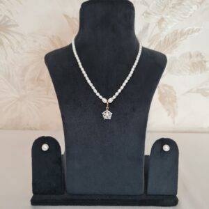 Precious White Oval Pearl 15Inch Necklace With A Wintery Rhodium Finish Pendant