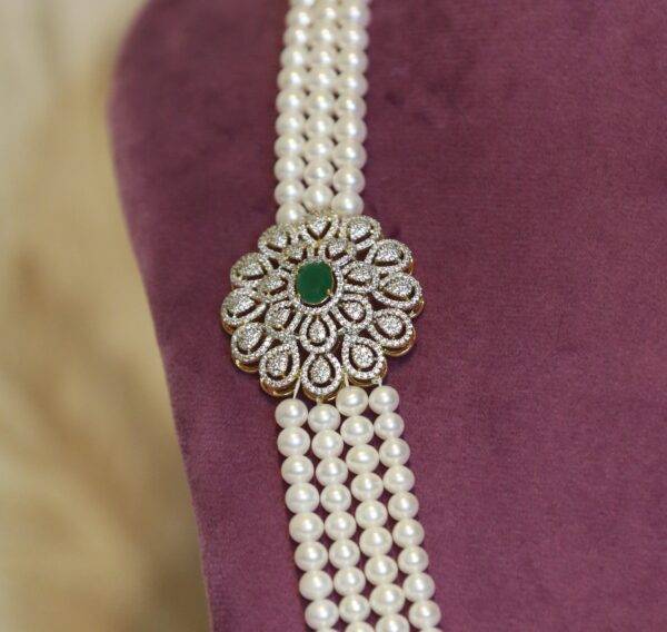 Resplendant White Round Pearls Haar With CZ & SP Emerald Side Pendants