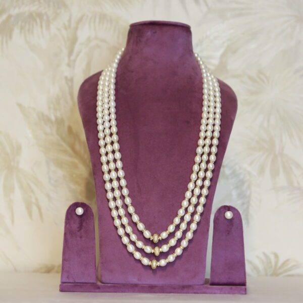 Classy Triple Line 10mm White Oval Pearls Mala With Zircon Spacers