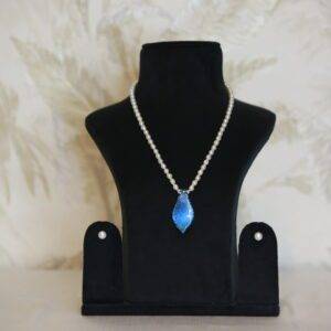Radiant 5mm White Oval Pearl 17Inch Necklace With A Blue Glass Pendant