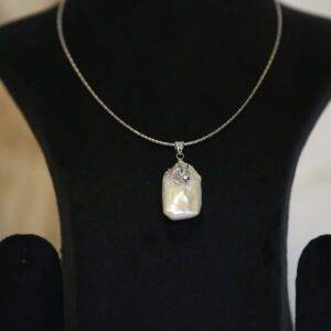 Charismatic White Baroque Pearl Pendant With CZ Floral 925 Silver Clasp