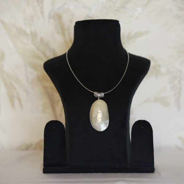 Exquisite Mother of Pearl Pendant With A Filigree Clasp