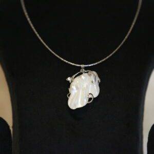 Exquisite Silver Finish Pendant Accentuated With Large White Baroque Pearl