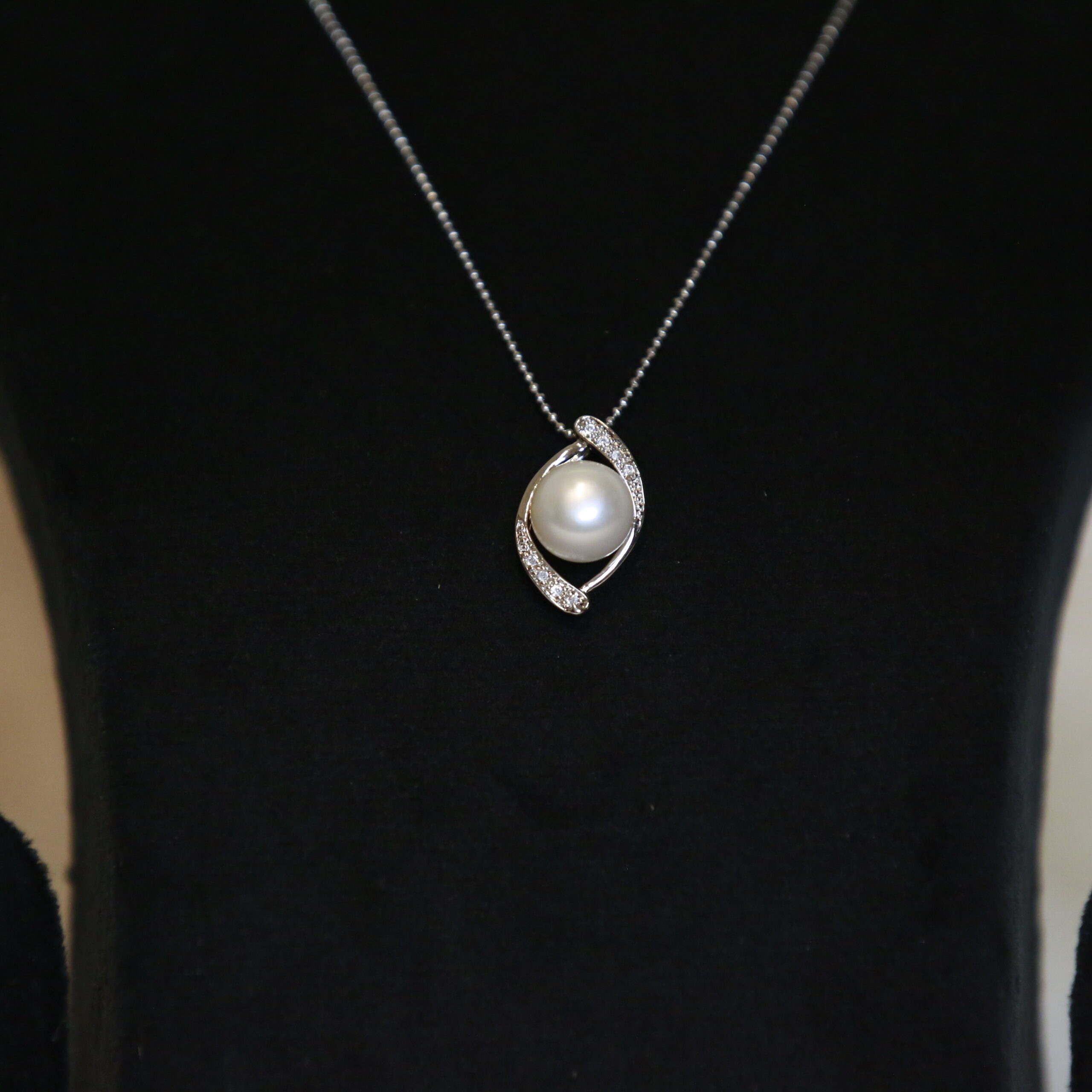 Eternal CZ Pendant Studded With 11mm White Button Pearl